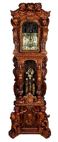 A Monumental English Carved Oak Tall Case Clock, LAST QUARTER 19TH CENTURY, Height 130 1/2 x width 48 x depth 33 inches.