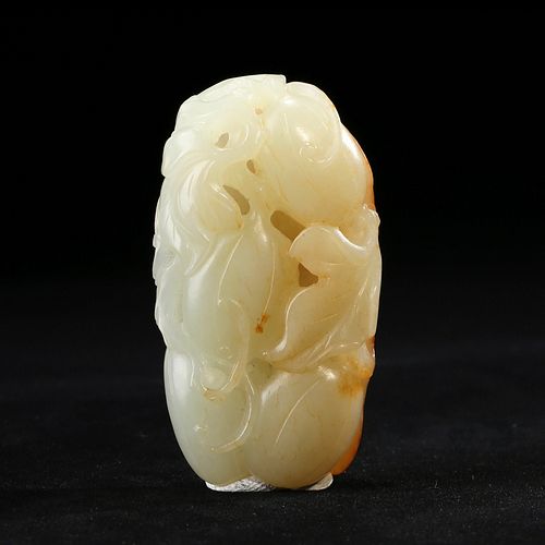 A CARVED JADE 'FRUITS AND GOURD' PENDANT