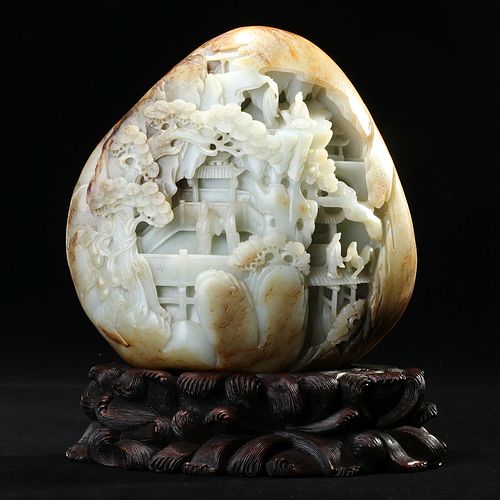 A CELADON AND RUSSET JADE 'LANDSCAPE AND FIGURES' CARVING