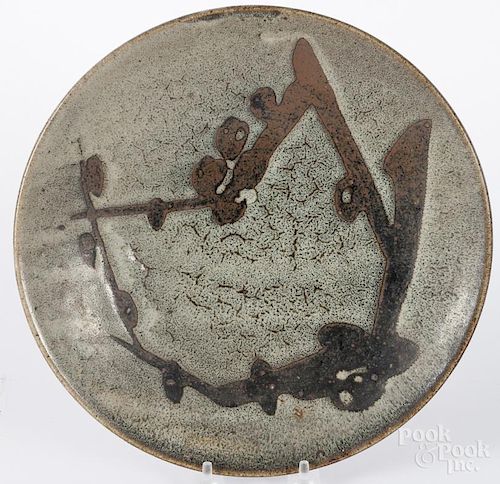 Attributed to Shoji Hamada (1894-1978), Japanese stoneware plate, 11'' dia.