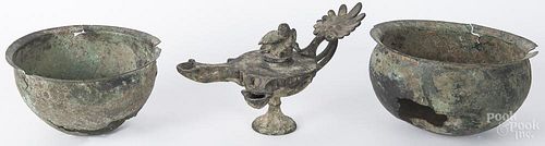 Two-part Roman bronze colander, together with a Middle Eastern fat lamp