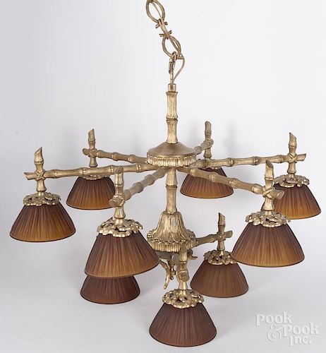 Hanging brass chandelier, 20th c., with frosted chocolate colored shades, 21'' h.