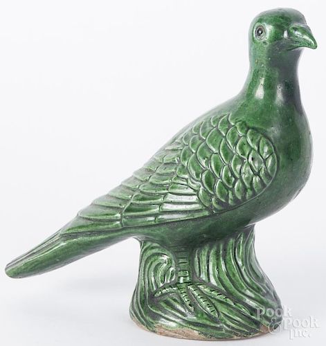 Continental pottery dove, 19th c., with a green glaze, 6 1/2'' h.