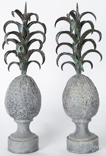 Pair of lead and bronze pineapple garden ornaments, early 20th c., 28 1/2'' h.
