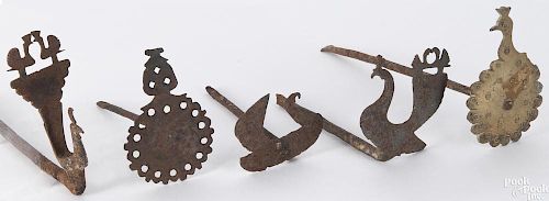 Five iron peacock wall hooks, to include one with a brass head, 19th c., largest - 4'' h., 9'' l.