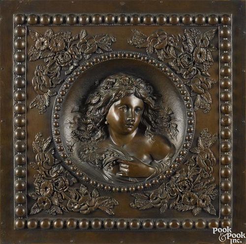 Pair of relief copper wall plaques, ca. 1900, with portraits of girls, 17'' x 16 1/2''.
