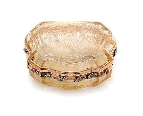 A Russian Gold Mounted and Jeweled Carved Topaz Box, St. Petersburg, 19th Century, of shield form with incised rocaille decorati