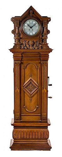 * A German Walnut Musical Triple Disc Eroica Tall Case Clock, Height 85 1/2 inches.