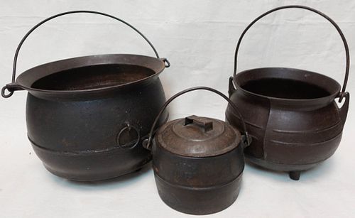 Three Antique Iron Kettles