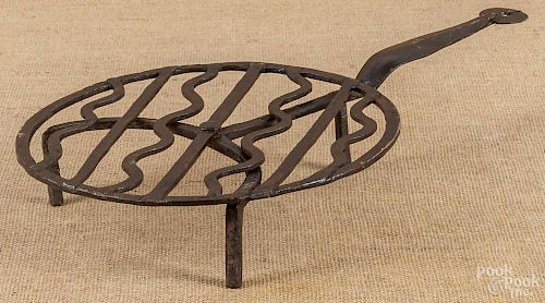 Cast iron revolving trivet, early 19th c.