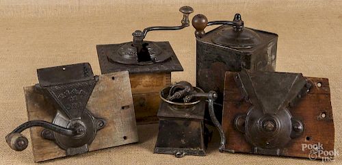 Five tin, iron, and wood coffee grinders, 19th c.