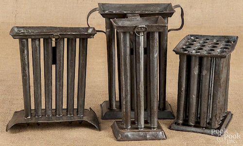 Four tin candle molds, 19th c.