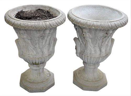 Pair of Outdoor Planters, each in the form of an urn with Neoclassical designs to body, height 31 inches, diameter 22 inches.