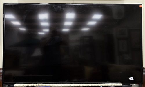 Samsung 60" Flat Screen Television, along with a Samsung Blu-Ray player.