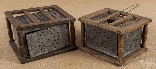Two pine and punched tin foot warmers, 19th c.