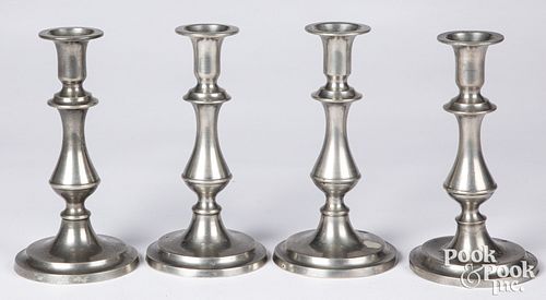 Set of four pewter candlesticks, 19th c.
