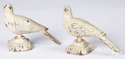 Pair of painted cast iron bird finials, ca. 1900