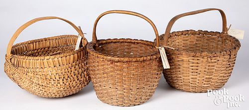 Three antique split oak baskets, largest - 13" h.,