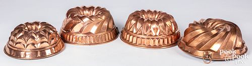 Four antique copper food molds