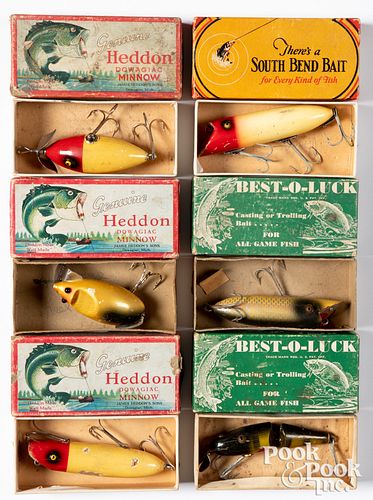 Six vintage fishing lures in boxes