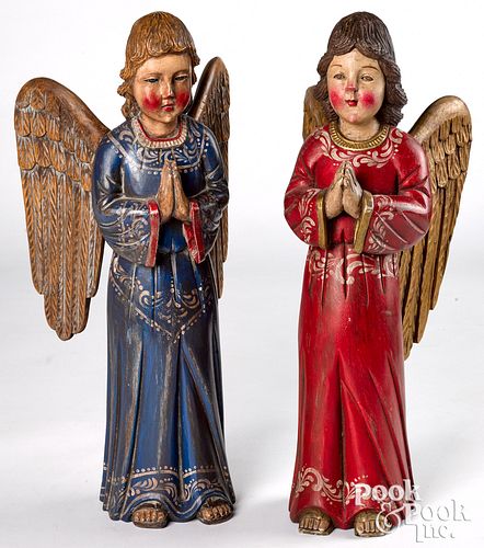 Contemporary carved and painted praying angels
