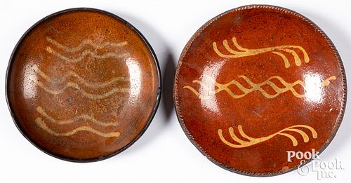 Two Pennsylvania redware plates, 19th c.