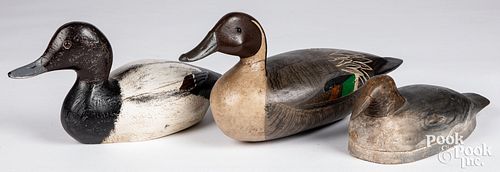 Three carved and painted duck decoys, 20th c.