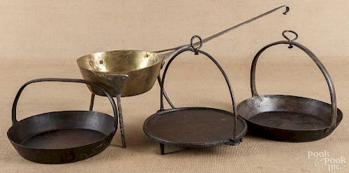 Three wrought iron hanging griddles, 19th c.