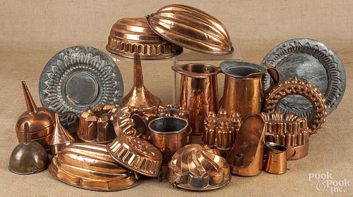 Large collection of copper cookware and molds