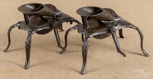 Two cast iron cherry pitters, 19th c.