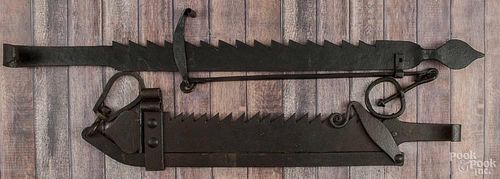 Two wrought iron sawtooth trammels, ca. 1800