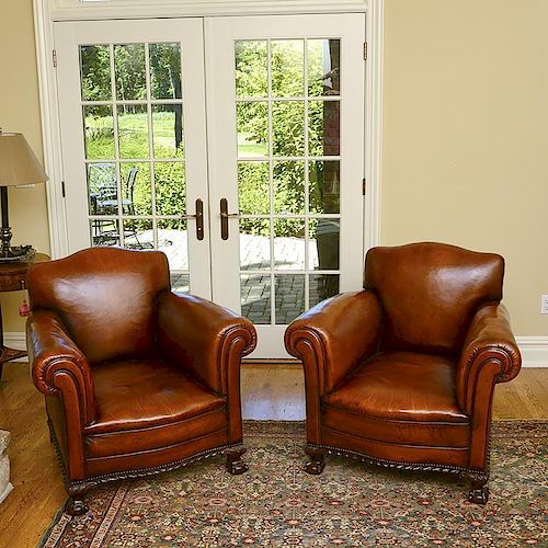 Very nice pair leather upholstered club chairs