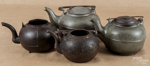 Four cast iron tea kettles, 19th c.
