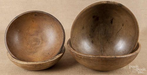Four turned wooden bowls, 19th c.