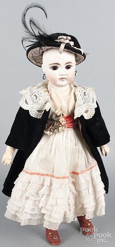 Bisque Belton-type doll, incised 117 and 14, with brown paperweight eyes, a closed mouth