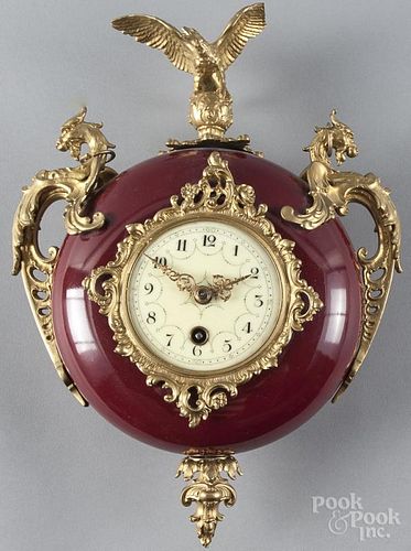 German Lenzkirch hanging clock, early 20th c., with a red enameled and brass mounted case