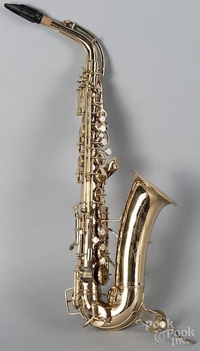C. G. Conn of Elkhart, Indiana brass saxophone, serial # M267799A, with Conn case, a mouthpiece