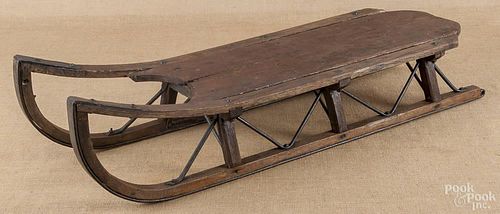 Primitive wood and iron sled, ca. 1900