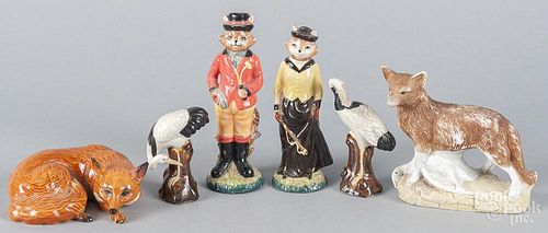 Porcelain animal figures, 20th c., to include a Beswick fox, a bisque coyote with a goose