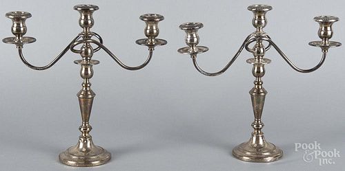 Pair of sterling silver weighted candelabra, 20th c., 13 1/2'' h.