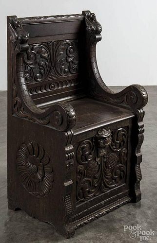 English carved oak chair, 19th c.