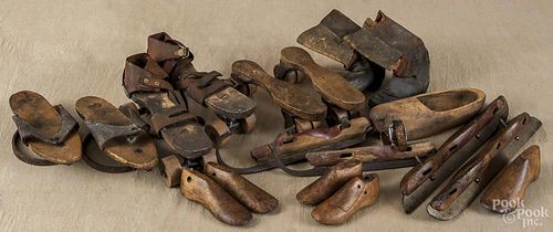 Group of wooden ice skates and roller skates, 19th/20th c.