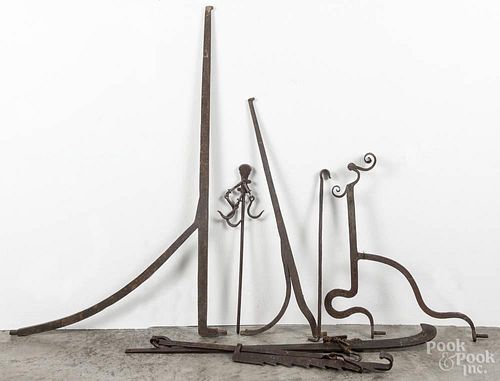Three wrought iron trammels, 19th c.