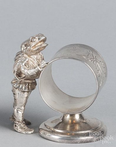 Silver-plate figural napkin ring, early 20th c., of a frog, 3 1/4'' h.
