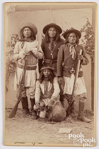Cabinet card photo of four Native American Indians