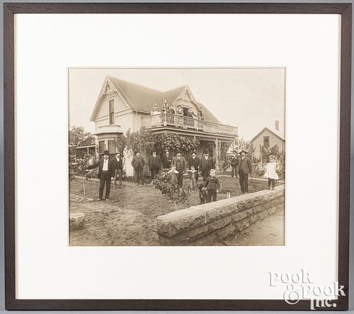 Large photograph of a Victorian family and home