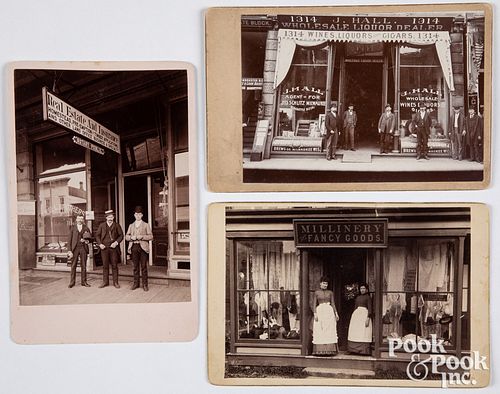 Three cabinet card photographs of storefronts