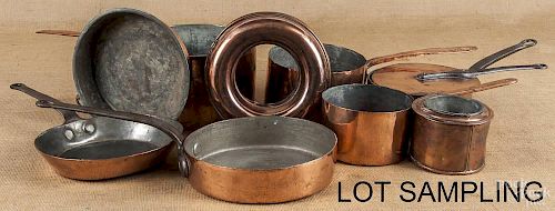 Eleven copper and iron cooking pots and pans