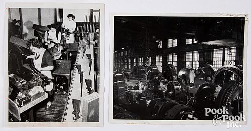 Two press photos, to include Winchester factory