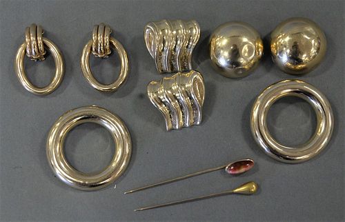 Group of Gold Jewelry, to include four pairs of 14 karat gold earrings and two pins, 72 grams.
